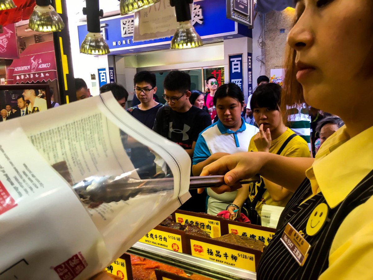 A line of customers waiting for their beef jerky